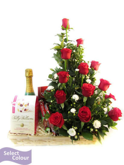 Roses and chocolates packed in basket